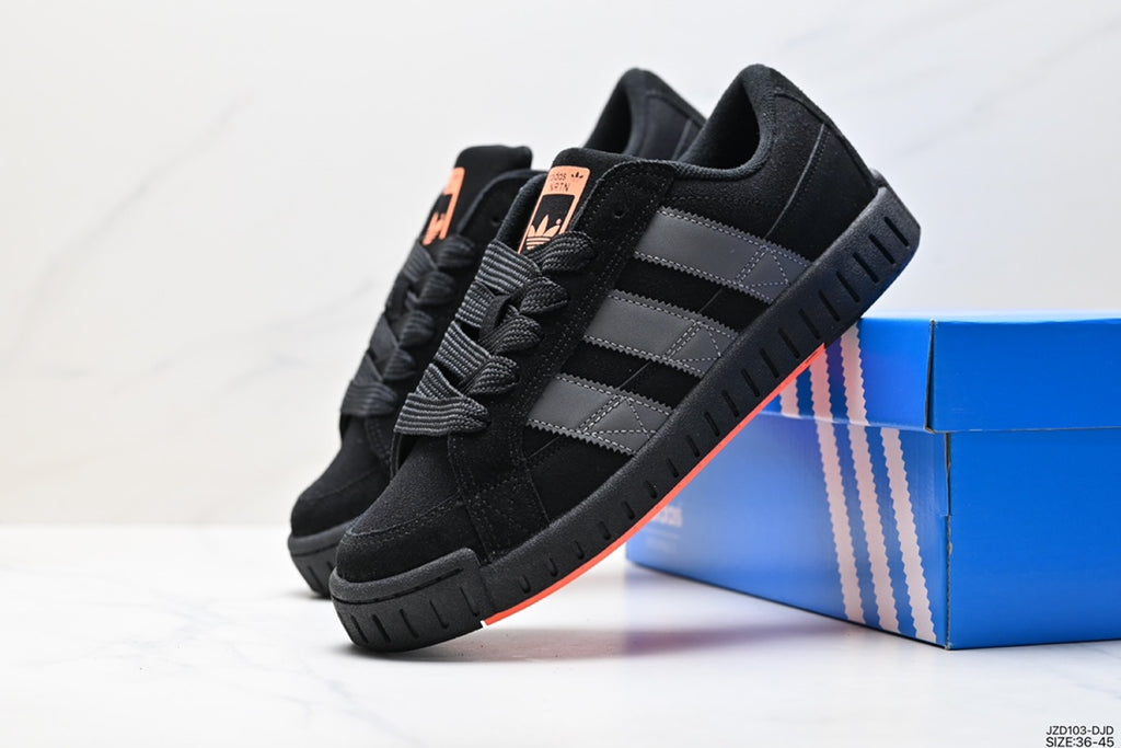 Men's black retro low-top sneakers - angled view